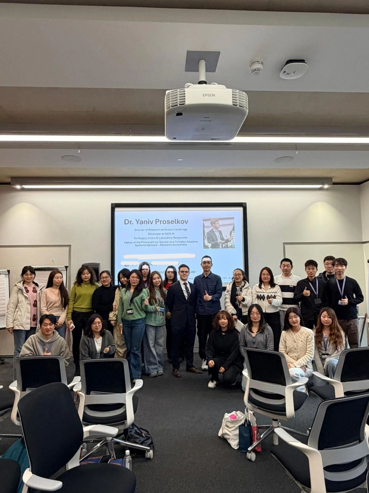 Dr. Yaniv Proselkov delivering a lecture at Judge Business School, Cambridge, to an audience of around 25 students.